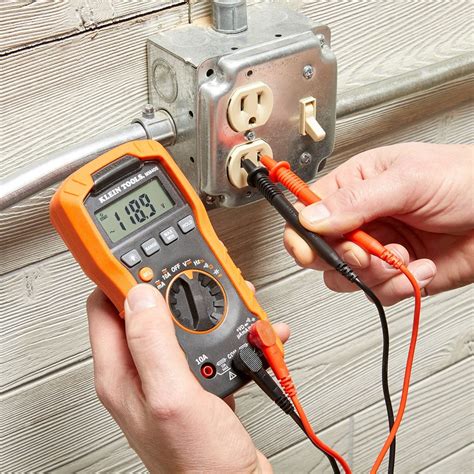 how to use a multimeter on an electrical box|how to test outlets multimeter.